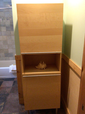 Light wood freestanding cabinet with shelves  - Image 1 of 3