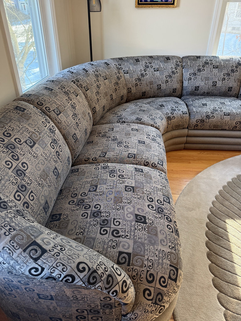 Curved gray patterned sectional sofa - image 1 of 5