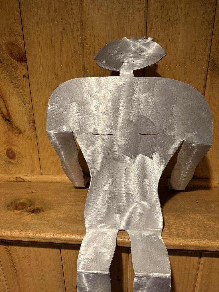 Two metal silhouette sculptures of seated humanoid figures - image 3 of 5