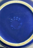 Blue ceramic teapot with mugs and kitchenware on a wooden tray - thumbnail 4 of 7