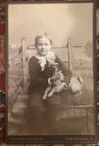 4 Cabinet Photos Cleveland Family Members With Their Dogs - thumbnail 2 of 5