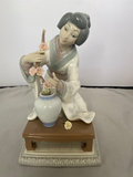 Japanese Girl Arranging Flowers 4840 - thumbnail 1 of 5