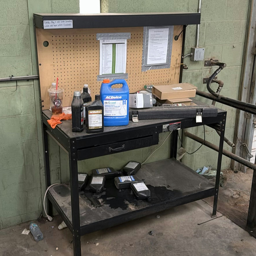 Industrial Workbench with Pegboard and Automotive Fluids - image 1 of 4