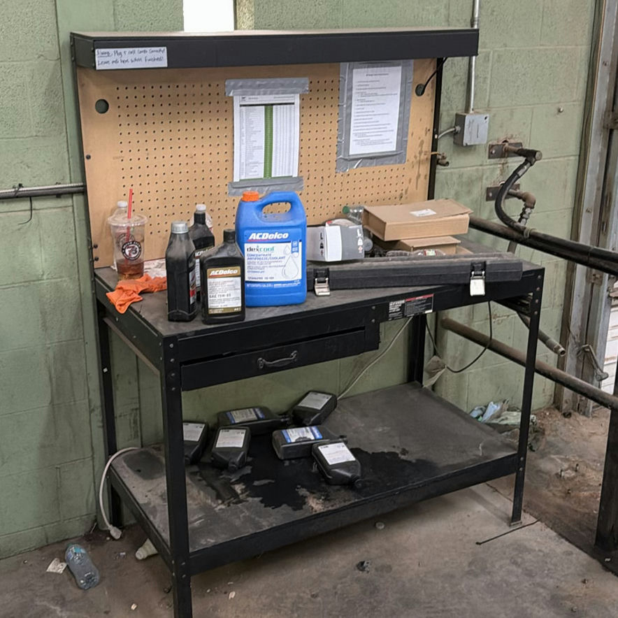Industrial Workbench with Pegboard and Automotive Fluids - image 2 of 4