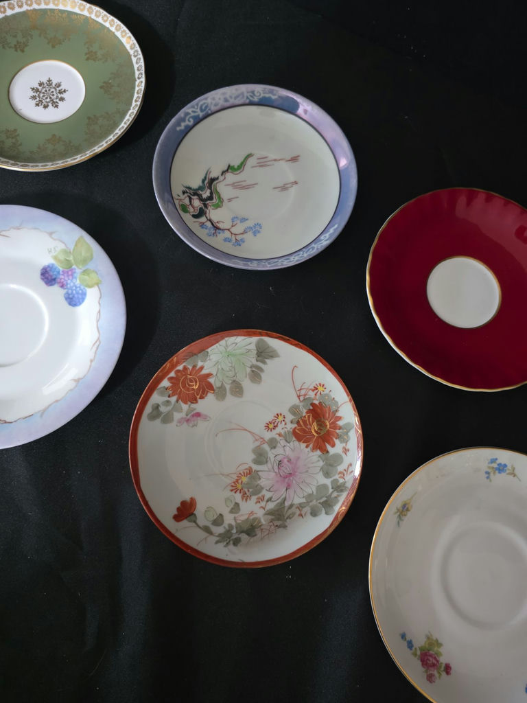 Assorted porcelain plates and saucers with floral and scenic designs - image 3 of 10