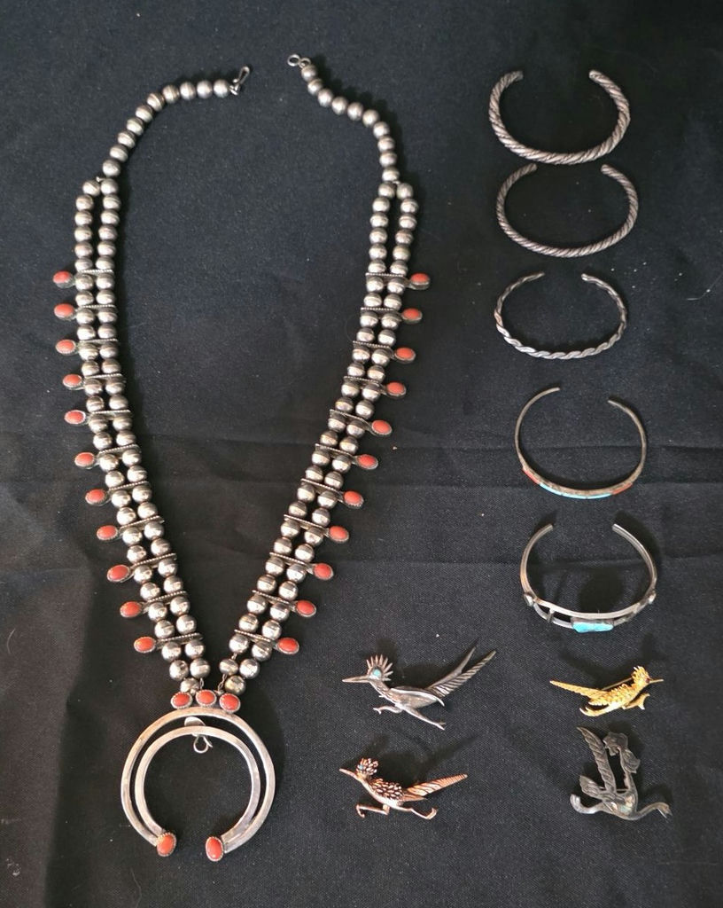 Silver jewelry collection with necklace, bracelets, and animal pins - image 1 of 5