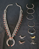 Silver jewelry collection with necklace, bracelets, and animal pins - thumbnail 1 of 5