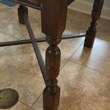 Dark wood dining table with panelled top and turned legs - thumbnail 3 of 8