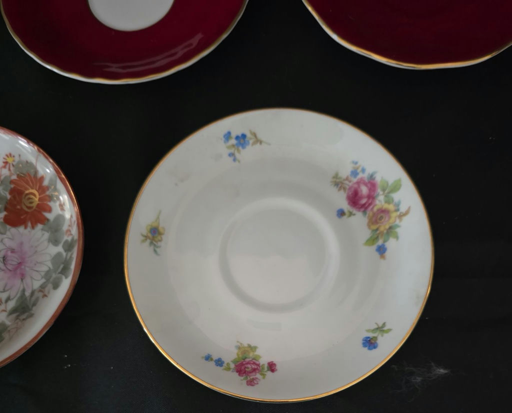 Assorted porcelain plates and saucers with floral and scenic designs - image 4 of 10