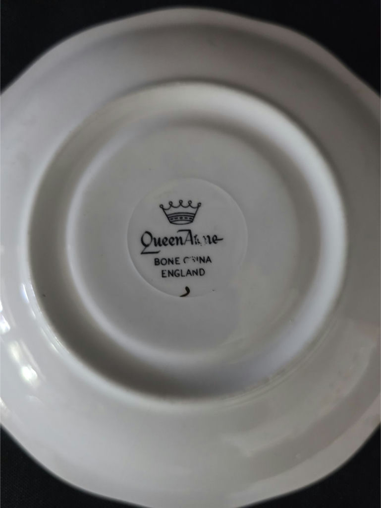 Assorted porcelain plates and saucers with floral and scenic designs - image 9 of 10