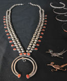 Silver jewelry collection with necklace, bracelets, and animal pins - thumbnail 2 of 5