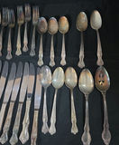 Assorted silver-plated flatware set (forks, spoons, knives) - thumbnail 7 of 10