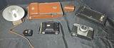 Vintage cameras and accessories in leather cases - thumbnail 1 of 4