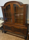 Oak china cabinet with glass display and carved lower storage - thumbnail 1 of 7