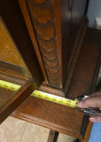 Oak china cabinet with glass display and carved lower storage - thumbnail 6 of 7