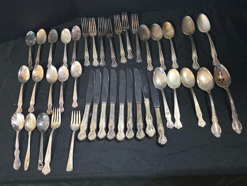 Assorted silver-plated flatware set (forks, spoons, knives) - image 1 of 10