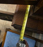 Oak china cabinet with glass display and carved lower storage - thumbnail 3 of 7