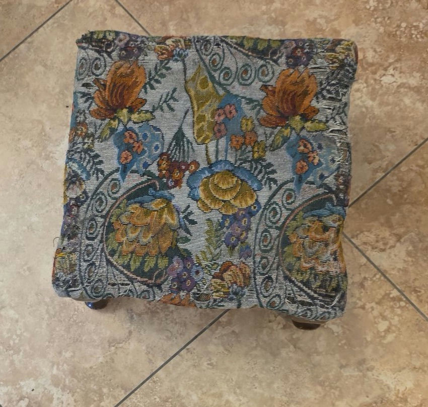 Round glass-top pedestal table with carved wooden base and floral upholstered ottoman - image 4 of 6