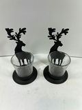 Pair of black metal deer silhouette candle holders with glass cups - thumbnail 1 of 4