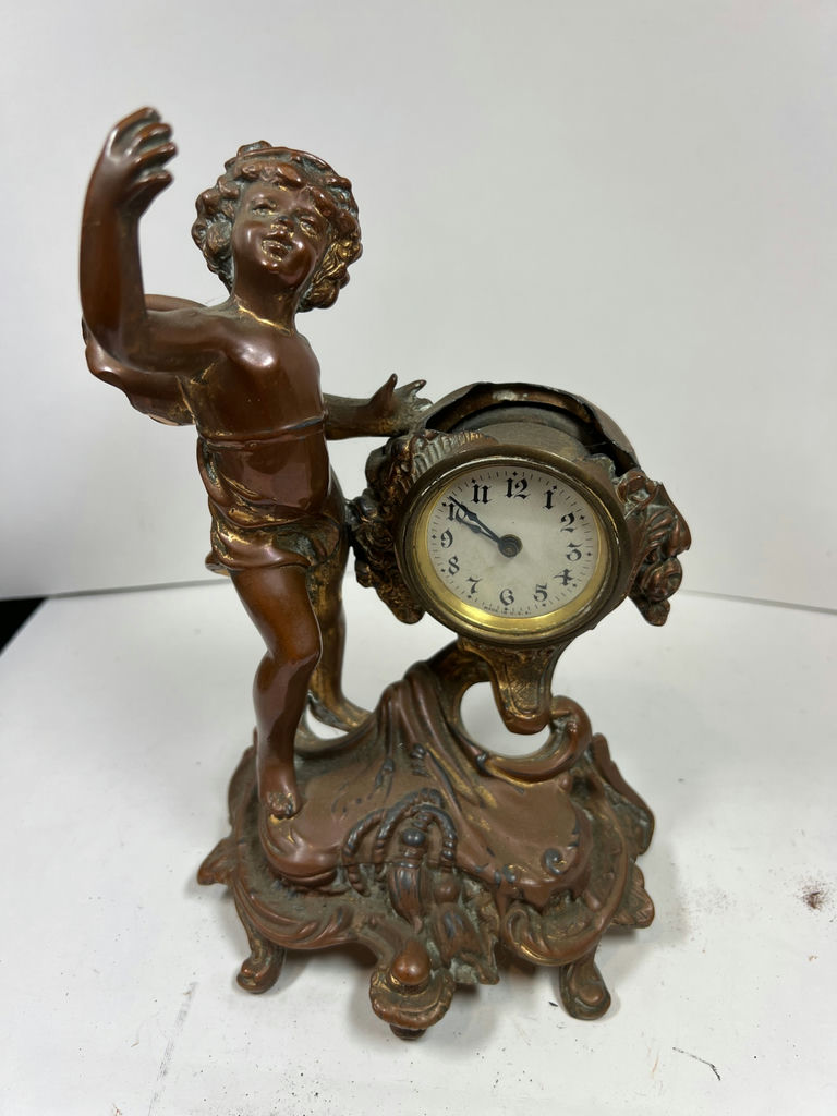 Bronze cherub clock statue - image 1 of 7