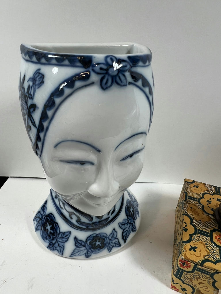 Blue-and-white porcelain head vase, decorative patterned box with jade figurine, cylindrical landscape ceramic vessel, and two seasonal plates - image 3 of 5