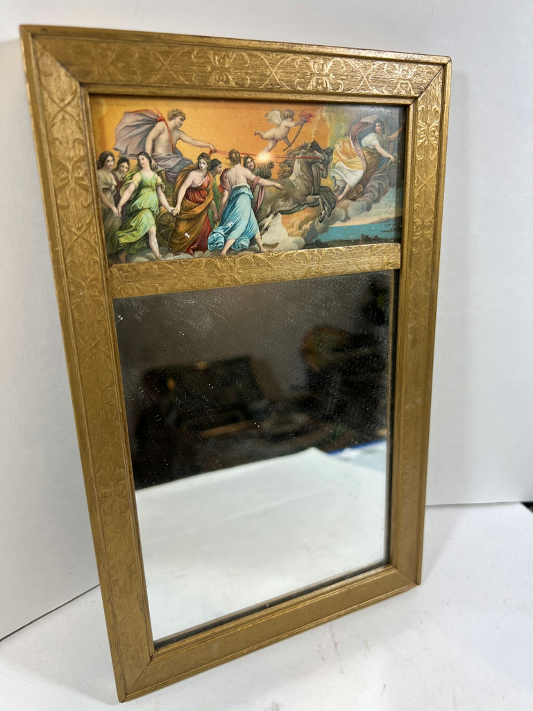 Gold framed wall mirror with classical painting panel and antique marbled-covered book - image 1 of 3
