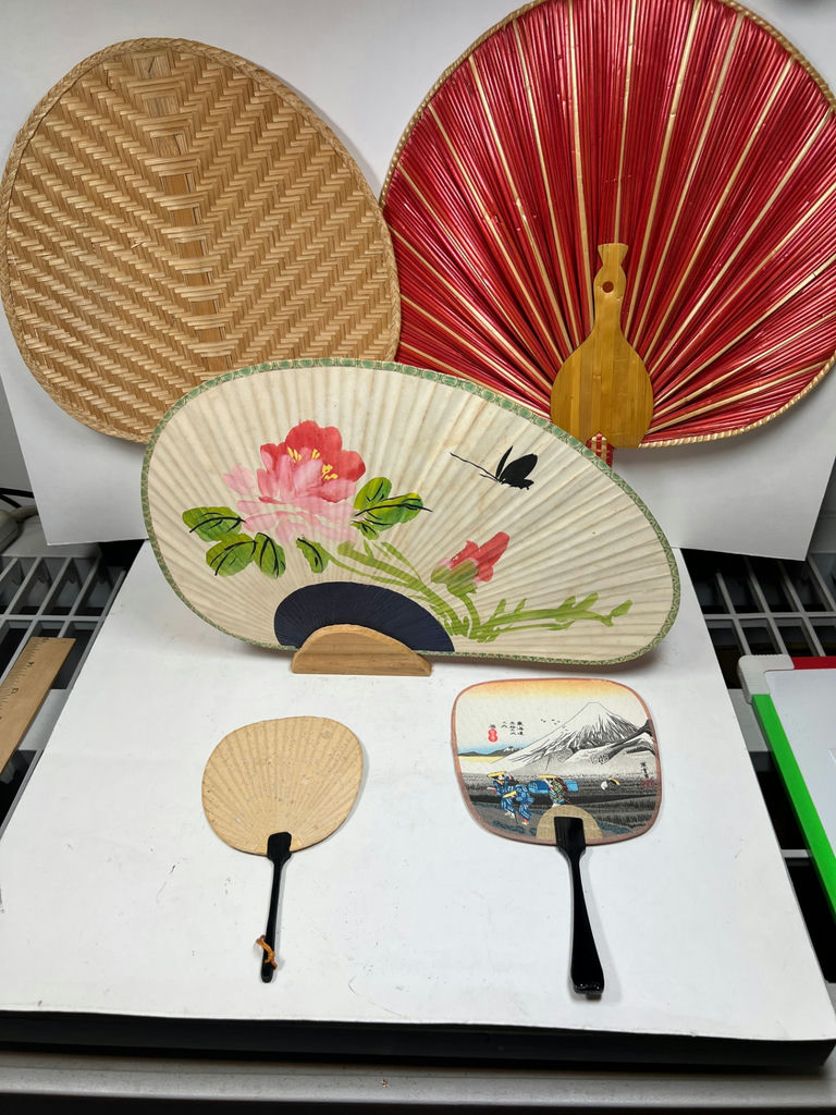 Assorted decorative handheld fans - image 1 of 6