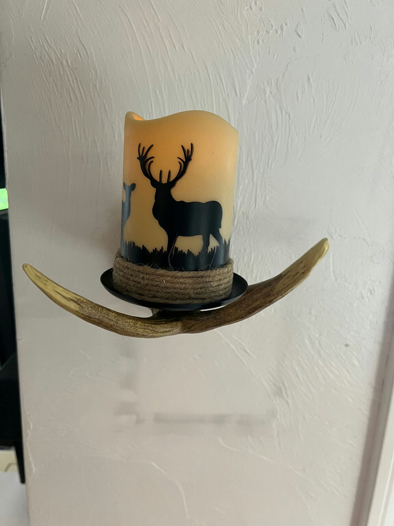 Rustic deer silhouette candle on antler wall sconce with remote and packaging - image 1 of 4