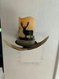 Rustic deer silhouette candle on antler wall sconce with remote and packaging - thumbnail 1 of 4