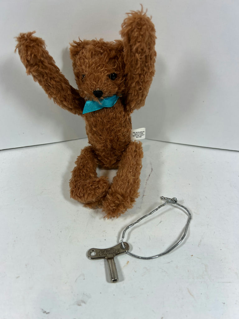 SHYLLING Brown plush dog with blue ribbon KEY WINDUP AND FLIP - image 1 of 5