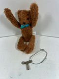 SHYLLING Brown plush dog with blue ribbon KEY WINDUP AND FLIP - thumbnail 1 of 5