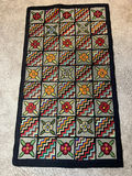 Patchwork quilted rug with floral and zigzag squares - 50" x 28" - thumbnail 1 of 4