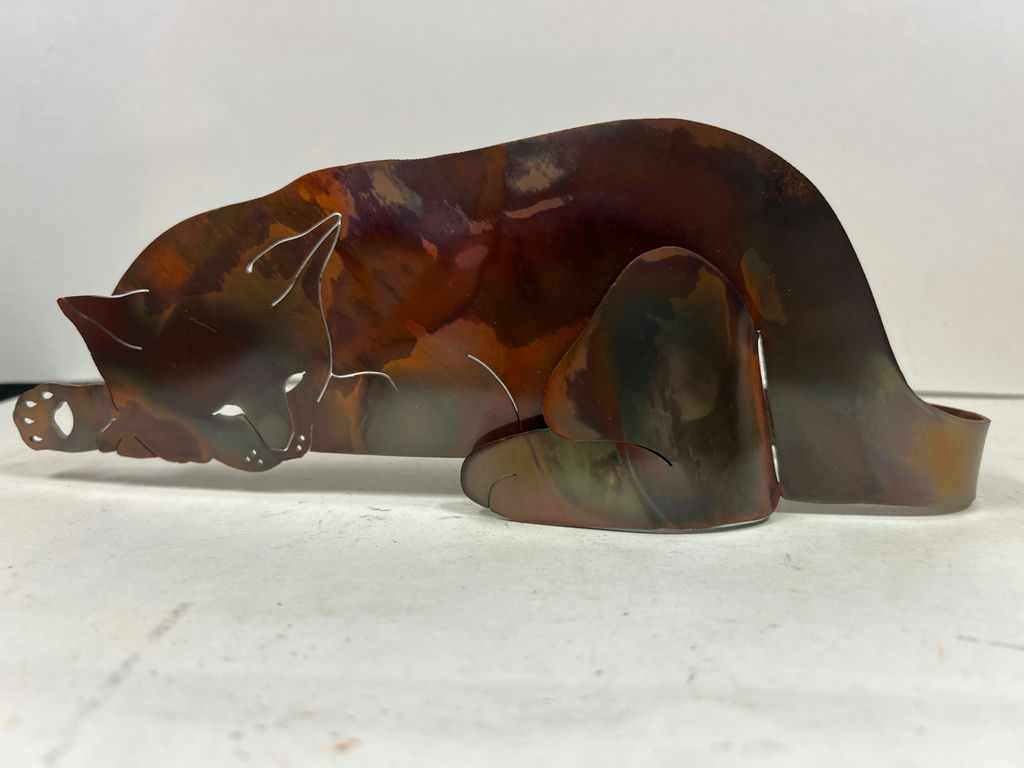 Metal reclining cat sculpture - image 1 of 3