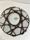 Pair of hand-painted porcelain plates with floral and bird designs in wicker frames - thumbnail 5 of 5