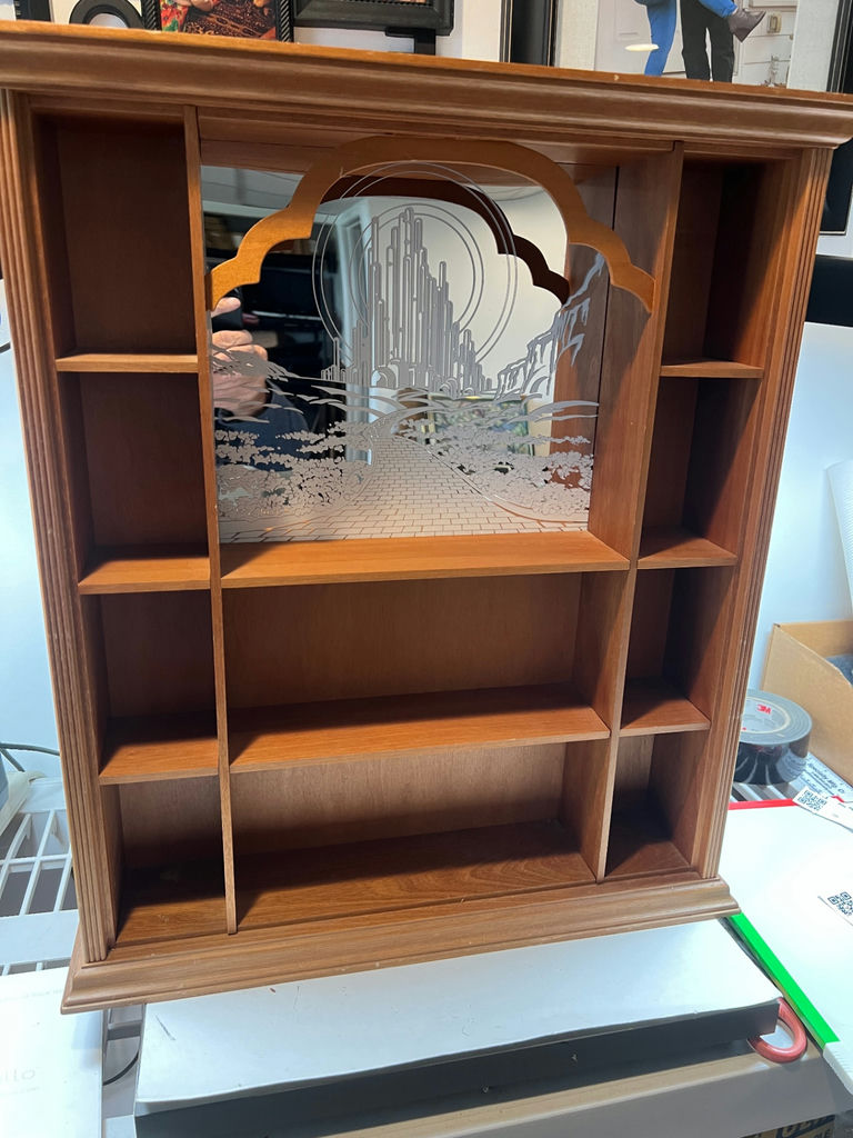 Wooden display cabinet with etched "Wizrd of Oz" mirrored back - 21" x 18-1/2" - image 1 of 3