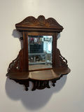 Carved wooden wall-mounted mirror with shelf from 1900's - thumbnail 1 of 6