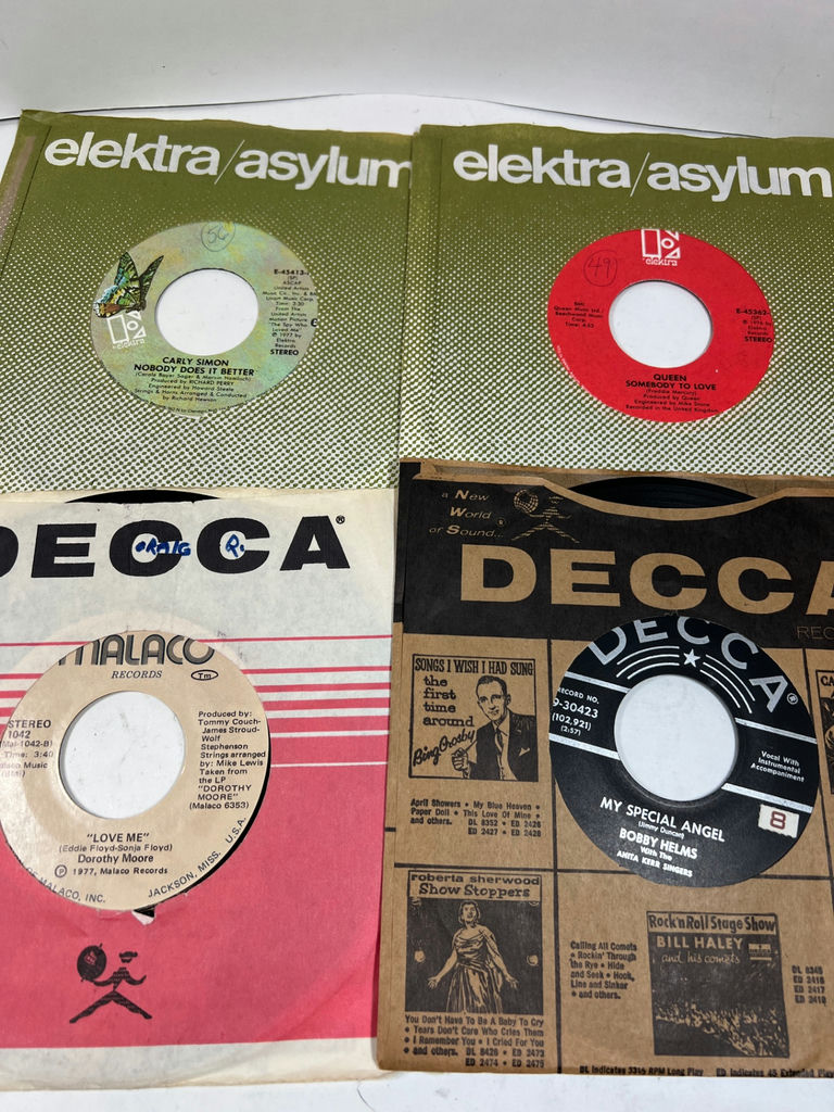 Collection of 60 vintage 45 RPM vinyl singles in assorted sleeves - image 11 of 17