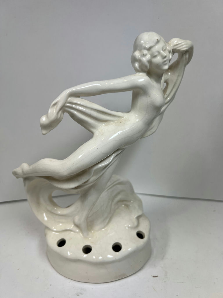 White ceramic dancing figure sculpture - image 1 of 5