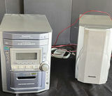 Panasonic CD stereo system with speakers and CD collection - thumbnail 2 of 4
