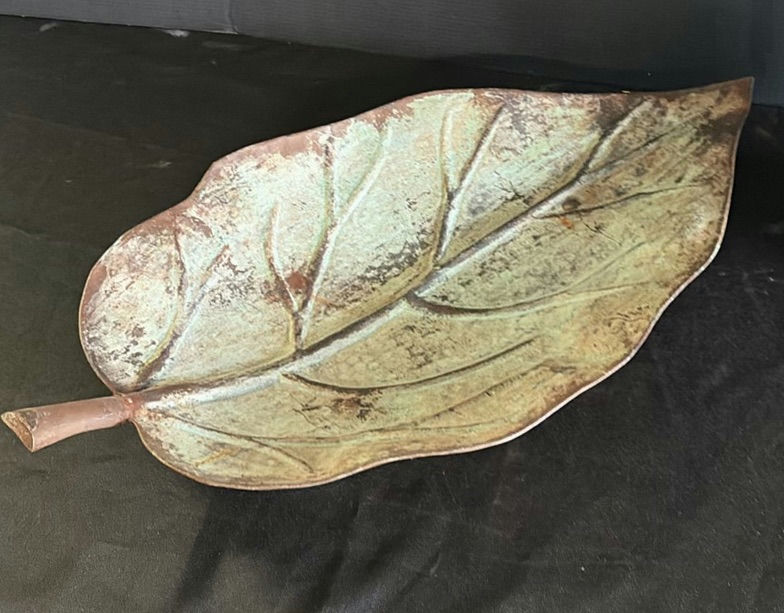 Leaf-shaped ceramic dish and red curved sculpture - image 2 of 3
