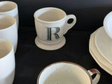 White ceramic dinnerware set with mugs, bowls, plates, and kitchen accessories - thumbnail 6 of 9