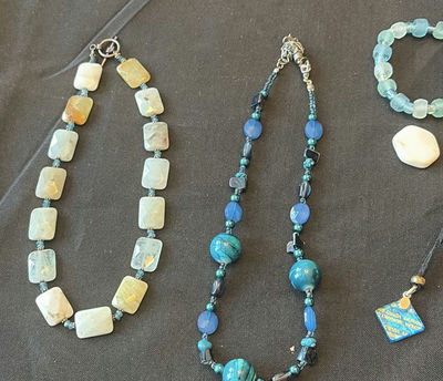 Assorted blue jewelry set (necklaces, bracelets, earrings, and pendants) - Image 1 of 7