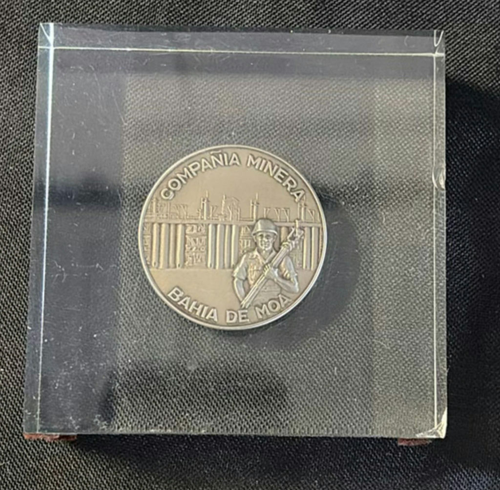 Collection of mining-related coins and medals in display cases - image 2 of 6