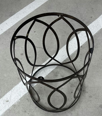 Metal Cylindrical Stand with Round Grate and Wooden Bird Wall Decor - Image 1 of 12