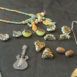Assorted jewelry collection: necklaces, bracelets, earrings, and rings - thumbnail 7 of 7