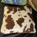 Decorative throw pillows: blue floral, kilim, and cowhide patterns - thumbnail 2 of 4