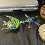 Assorted home decor items including glass sculptures, pottery, and textiles - thumbnail 3 of 5