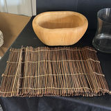 Wooden bowl, glass vase, bamboo placemat, slatted wooden trivet, and round beige disc - thumbnail 2 of 4