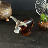 Mint-green clock, teal ruffled vase, brass-lidded container, penny-farthing bicycle sculpture, amber decanter, and glass pumpkin - thumbnail 5 of 6