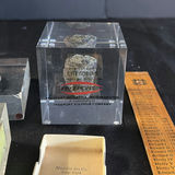 Collection of mining-related coins and medals in display cases - thumbnail 5 of 6
